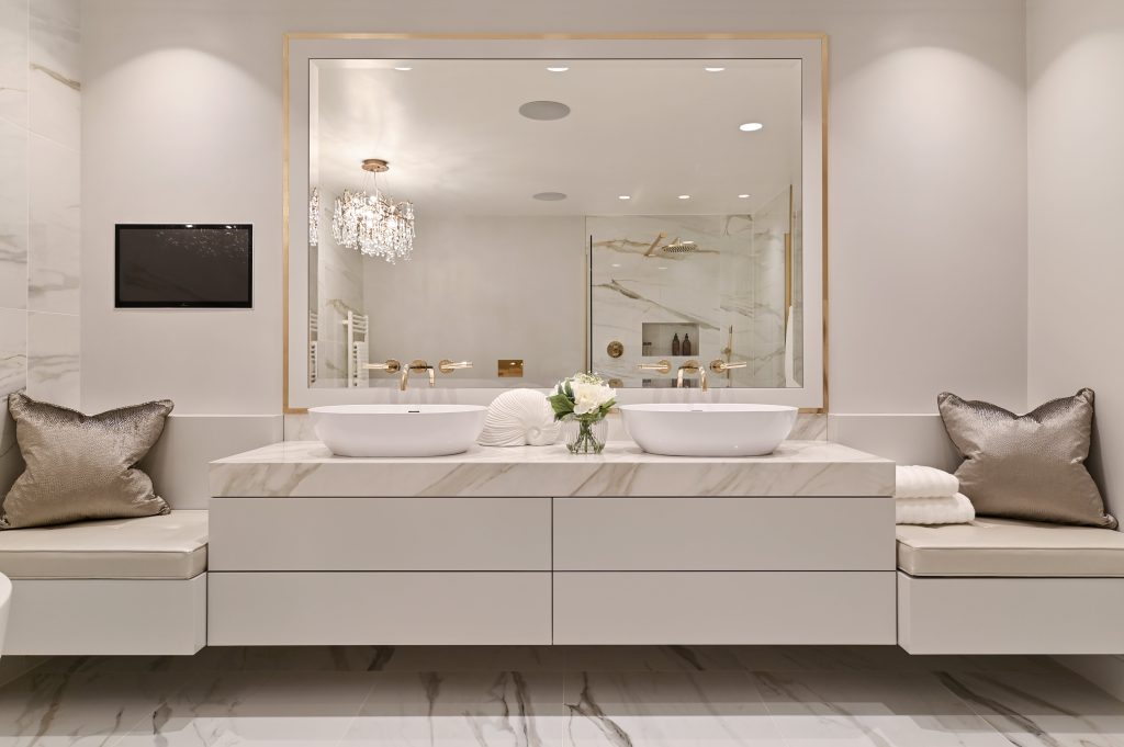 as top interior designers UK, this luxury bathroom was designed with carrara marble