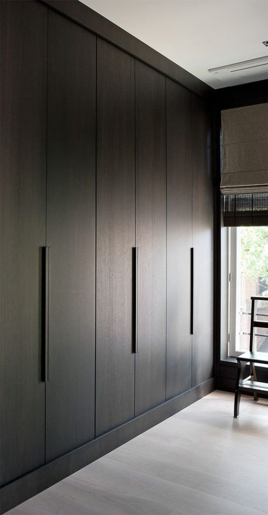 Dark wood built in wardrobes